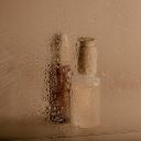 Two Skincare Bottles in a Steamy Mirror Reflection  screen for extension Chrome web store in OffiDocs Chromium