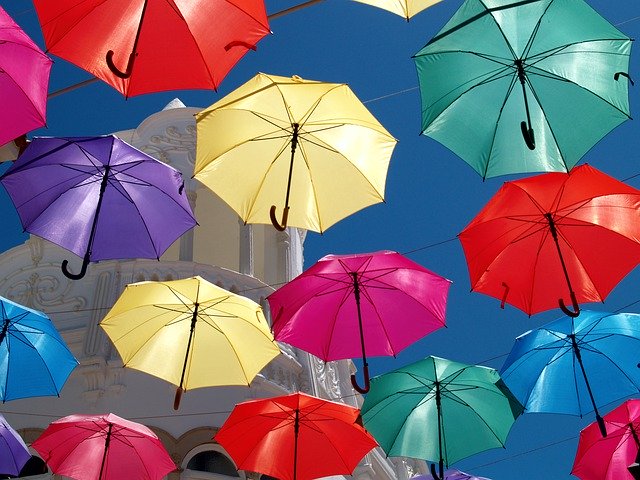 Безкоштовно завантажити Umbrella Parasol Colorful - безкоштовне фото або зображення для редагування в онлайн-редакторі зображень GIMP