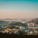 Urban Sprawl Amidst Mountainous Terrain  screen for extension Chrome web store in OffiDocs Chromium