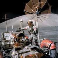 Free download View of Astronaut Eugene Cernan beside lunar roving vehicle during EVA free photo or picture to be edited with GIMP online image editor