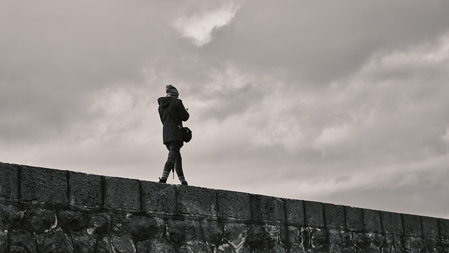 Free download walking stone wall alone woman sky free picture to be edited with GIMP free online image editor