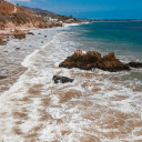Waves crashing on rocks  screen for extension Chrome web store in OffiDocs Chromium