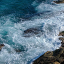 Waves crashing on the rocky shore  screen for extension Chrome web store in OffiDocs Chromium