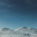 Winter Peaks Under Clear Skies  screen for extension Chrome web store in OffiDocs Chromium