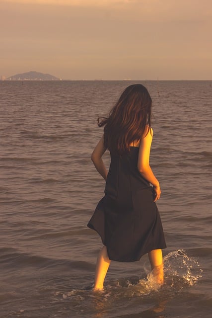 Free download woman back walking alone beach free picture to be edited with GIMP free online image editor