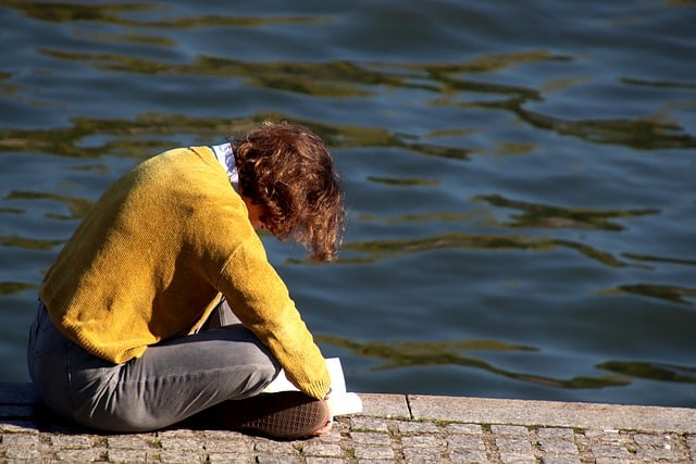 Free download woman seated leaning read book free picture to be edited with GIMP free online image editor