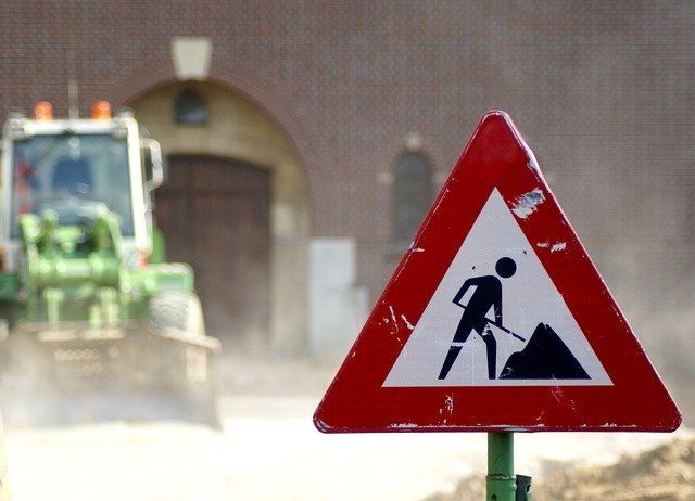 Gratis download Work Road Sign - gratis foto of afbeelding om te bewerken met GIMP online afbeeldingseditor