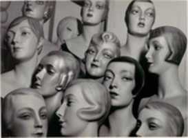 Free picture [Arrangement of 12 Female Mannequin Heads, Each with Distinct Physiognomy and Period Hair Style] to be edited by GIMP online free image editor by OffiDocs