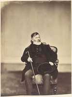 Free download [Seated Man with Cane and Hat] free photo or picture to be edited with GIMP online image editor