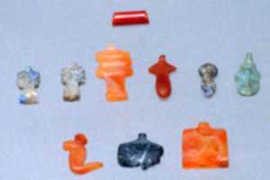 Free download 10 Amulets of Henettawy (C): 1 wedjat, 1 scarab, 3 djed pillars, 1 incised plaque, 1 uraeus, 2 wadj signs, and 1 cylindrical bead free photo or picture to be edited with GIMP online image editor