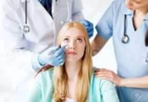 Free download 21575000 Healthcare Medical And Plastic Surgery Concept Plastic Surgeon And Nurse With Patient In Hospital Stock Photo free photo or picture to be edited with GIMP online image editor