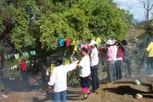 Free download 609. Stringing prayer flags above Lige Village free photo or picture to be edited with GIMP online image editor