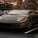 A Black Sports Car Parked on the Road  screen for extension Chrome web store in OffiDocs Chromium