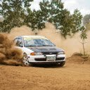 A car driving on a dirt road with dust flying up  screen for extension Chrome web store in OffiDocs Chromium