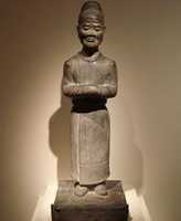 Free download A Chinese Limestone Statue Of A Mourning Attendant From The Tang Dynasty free photo or picture to be edited with GIMP online image editor
