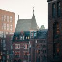 A city skyline with buildings and a clock tower  screen for extension Chrome web store in OffiDocs Chromium