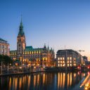 A city with a river and buildings at night  screen for extension Chrome web store in OffiDocs Chromium