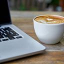 A Cup of Cappuccino Beside a Laptop  screen for extension Chrome web store in OffiDocs Chromium