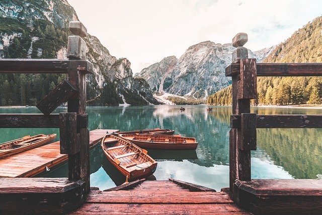 Free download adventure autumn boats braies lake free picture to be edited with GIMP free online image editor