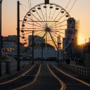 A ferris wheel at sunset on a street  screen for extension Chrome web store in OffiDocs Chromium