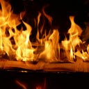 A fire is burning in a box with a book  screen for extension Chrome web store in OffiDocs Chromium