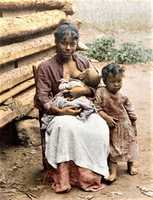 Free download African-American Woman breastfeeding baby with female child free photo or picture to be edited with GIMP online image editor