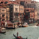 A gondola is floating down a canal in venice  screen for extension Chrome web store in OffiDocs Chromium
