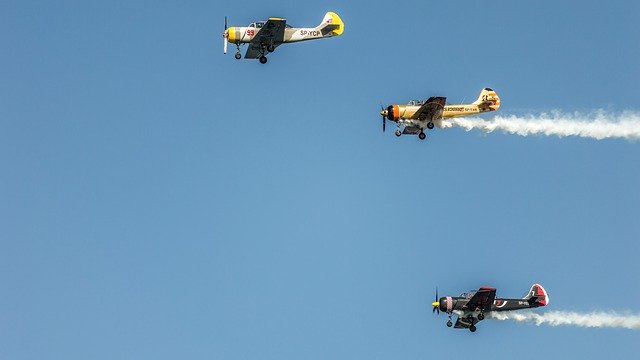 Free download airplane aircraft yak52 smoke free picture to be edited with GIMP free online image editor