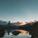 A Lake Surrounded by Mountains  screen for extension Chrome web store in OffiDocs Chromium