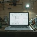 A Laptop on a Work Table  screen for extension Chrome web store in OffiDocs Chromium
