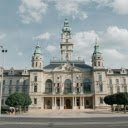 A large building with a clock tower and a clock  screen for extension Chrome web store in OffiDocs Chromium