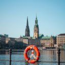 A life preserver on a pier in front of a church  screen for extension Chrome web store in OffiDocs Chromium