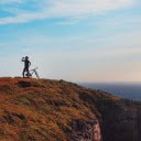 A Man with a Bicycle on a Cliff  screen for extension Chrome web store in OffiDocs Chromium