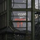 A neon sign in front of a building  screen for extension Chrome web store in OffiDocs Chromium