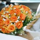 A Person Holding a Bouquet of Beautiful Orange Roses  screen for extension Chrome web store in OffiDocs Chromium