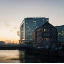 A river with buildings in the background at sunset  screen for extension Chrome web store in OffiDocs Chromium