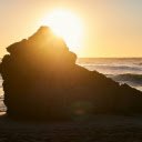 A Rock Formation on a Beach at Sunset  screen for extension Chrome web store in OffiDocs Chromium