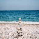A Stack of Rocks on a Rocky Beach  screen for extension Chrome web store in OffiDocs Chromium