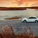 Audi Sedan at Sunset Waterside  screen for extension Chrome web store in OffiDocs Chromium