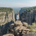 Back View of a Woman in a White Dress at Tazı Kanyonu  screen for extension Chrome web store in OffiDocs Chromium
