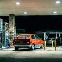 Back View of Red Volkswagen Gol at Gas Station  screen for extension Chrome web store in OffiDocs Chromium