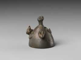 Free download Bell with heads of a ram, a jackal, and a bovine with a yoke ending in uraei free photo or picture to be edited with GIMP online image editor