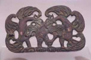 Free download Belt Buckle with Raptors and Tigers free photo or picture to be edited with GIMP online image editor