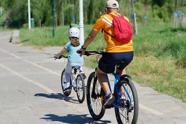 Free download bike ride father daughter cyclists free picture to be edited with GIMP free online image editor