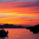blazing red sky at sunset over the sea  screen for extension Chrome web store in OffiDocs Chromium
