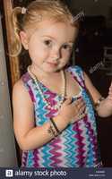 Free download blonde-3-year-old-toddler-girl-looking-at-camera-E4H6WE free photo or picture to be edited with GIMP online image editor