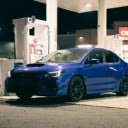 Blue Car at Nighttime Gas Station Stop  screen for extension Chrome web store in OffiDocs Chromium