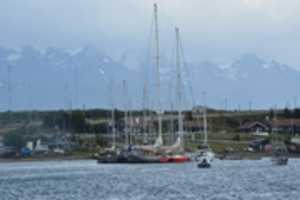 Free download Boats Moored in Ushuaia Harbor free photo or picture to be edited with GIMP online image editor