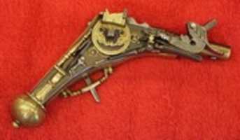 Free download Brass Palm Pistol free photo or picture to be edited with GIMP online image editor