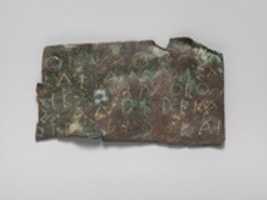 Free download Bronze fragment of an inscription free photo or picture to be edited with GIMP online image editor